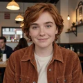 Jess, a non-binary person in their late twenties at a warm-lit Brooklyn restaurant